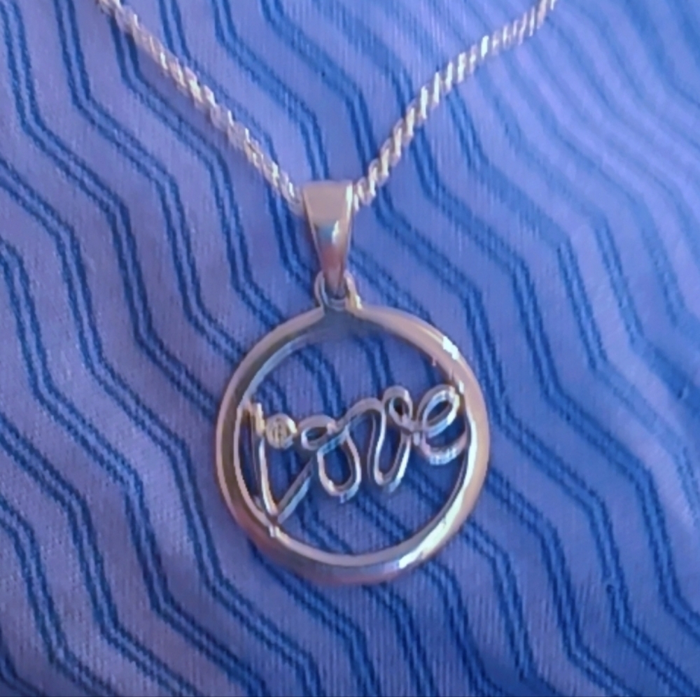 Elegant Silver 'Love' Pendant Necklace With Diamond